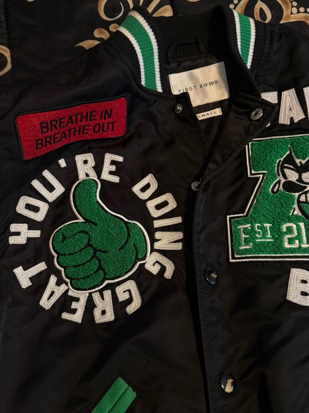 First Row Black Bomber Jacket with Green Appliqué - Small